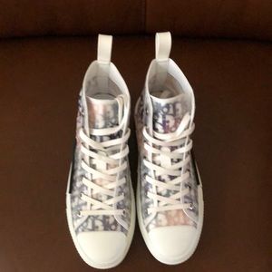 High top CD canvas laced up women shoes .